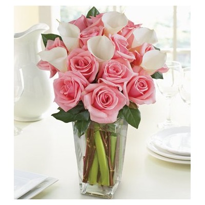 Pink roses with white Calla lilies