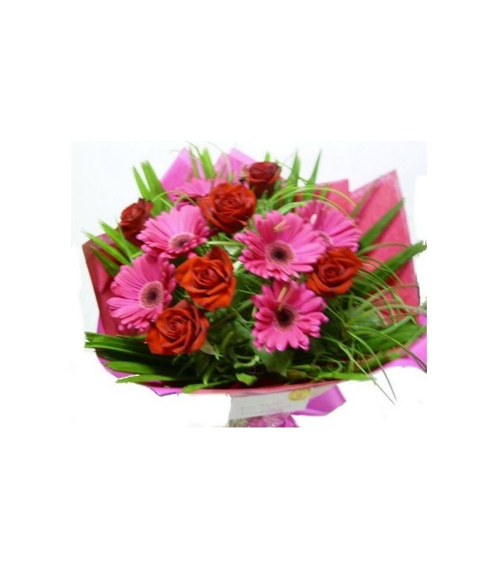 A vibrant mix of gerberas and roses presented in a bouquet A vibrant mix of gerberas and roses presented in a bouquet